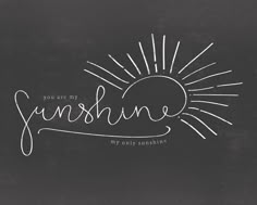 the words you are my sunshine written in chalk on a blackboard with sunbursts