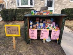 an outdoor food stand with signs on it and a free sign next to it that says, please we are in this neighborhood