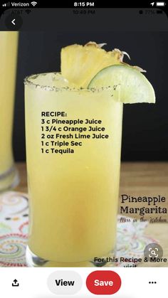 the recipe for pineapple juice is in a glass with a lime slice on top