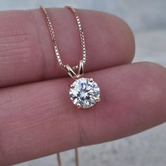 "Moissanite Solitaire Necklace VIDEO * Check out an HD video of our beautiful Moissanite pendant to appreciate its true beauty, simply copy & paste the link below: https://youtu.be/cN3POJeAqgw * This is a beautifully faceted, high quality Moissanite gemstone pendant with brilliant flashes with each and every subtle movement. Our Moissanite gemstones have been hand cut by quality Artisan gemstone artists, resulting in ultra fine brilliance, luster and fire. They shine like diamonds without the pr Necklace Video, Mothers Day Jewelry, Diamond Pendants Designs, Modern Gold Jewelry, Moissanite Pendant, Solitaire Necklace, Moissanite Necklace, Gold Chain With Pendant, Solitaire Necklaces