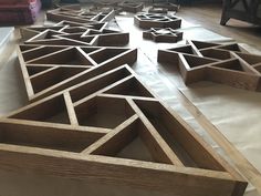 several pieces of wood sitting on top of a table