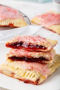 strawberry hand pies stacked on top of each other with text overlay reading step - by - step instructions to making gluten - free pop tarts