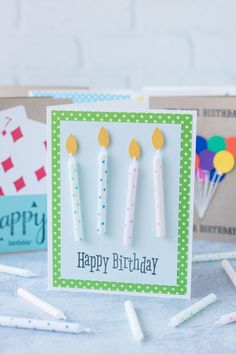 a birthday card with candles on it and the words, 10 simple diy birthday cards