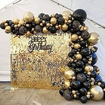 a black and gold birthday balloon arch