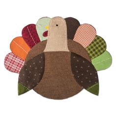 a turkey shaped applique on a white background