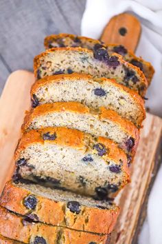 slices of blueberry bread on a cutting board