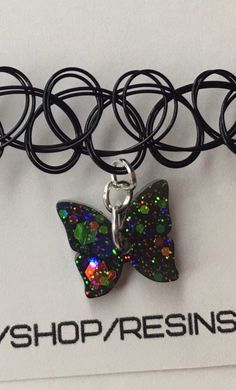 Black Holographic Butterfly Choker 90s Elastic Tattoo - Etsy Adjustable Iridescent Choker Jewelry, Adjustable Black Fantasy Choker, Adjustable Rave Choker For Gifts, Adjustable Rave Choker For Gift, Adjustable Rave Choker As Gift, Black Fantasy Choker For Gift, Black Fantasy Choker As A Gift, Black Fantasy Style Choker For Gift, Black Fantasy Style Choker As Gift