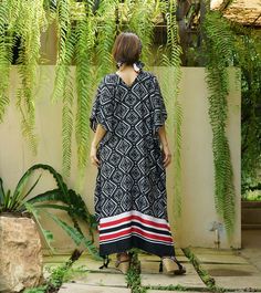 "A soft, comfy, printed maxi kaftan with tassel hem and matching hair scarf. A must have piece for this summer. Team this dress with sandal and a big tote to complete a casual chic, or wear it to a garden party, Sunday brunch and beach party. Material: 100% printed polyester (non stretch) Model is 161 cm. tall with 32\" bust, 28\" waist and 38\" hip (wearing 3\" high heel shoes) Status: ready to ship weight: 291g (dress), 40g (hair scarf) Measurement: kaftan dress (approximately) Width: 35\" Bus Patterned Tunic Maxi Dress For Vacation, Vacation Ikat Print Maxi Dress, Maxi Beach Cover-up Dress With Tassels, Traditional Patterned Maxi Dress For Beach, Patterned Maxi Dress For The Beach, Patterned Long Maxi Dress For The Beach, Long Maxi Dress With Tassels For Beach, Long Tassel Maxi Dress For Beach, Long Tassel Maxi Dress For Beach Cover-up