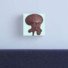 an image of a man with a weird haircut on it's face canvas print