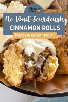 cinnamon rolls with icing on top and the words, no wait sourdough cinnamon rolls