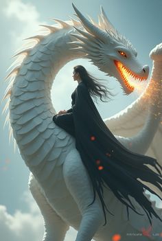 a woman riding on the back of a white dragon