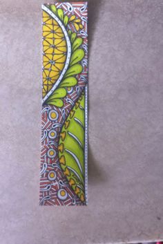 a bookmark with an abstract design on it