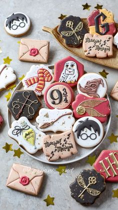 some decorated cookies are on a plate