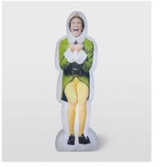 a figurine of a woman in green and yellow clothes with her mouth open