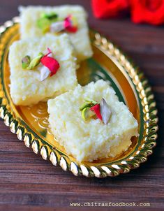 three pieces of rice cake on a gold plate