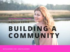 a woman standing in front of a lake with the words building a community