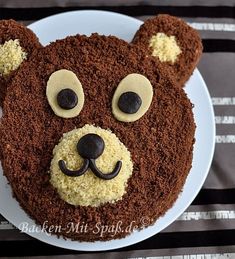 a cake decorated to look like a bear's head