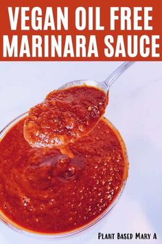 a spoon full of marinara sauce with the title vegan oil free marinara sauce