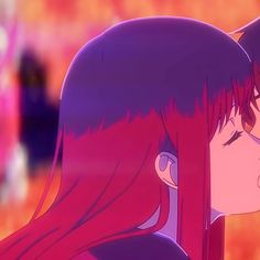 two anime characters are kissing each other in front of an orange and pink background,