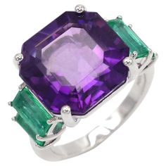 Ring 18K White Gold  Weight 6,62 GMS  Amethyst-1/10.1 Cts Emerald-4/1.775 Cts Size 52.5 Indulge in the epitome of elegance with our exquisite Ring featuring a substantial center stone. Crafted from 18K White Gold, weighing 6.62 grams, this captivating piece is adorned with a majestic Amethyst, boasting an impressive 10.1 carats. Adding to the allure are four Emeralds, totaling 1.775 carats, delicately set to complement the rich hue of the Amethyst. The combination of these vibrant gemstones crea Gold Cushions, Rings For Her, 1 Carat, Cushion Cut, Modern Jewelry, Jewelry Branding, Jewelry Earrings Studs, Precious Metals, Precious Stones