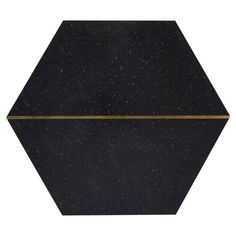 a black and gold hexagonal tile with an arrow on the center, isolated against a white background