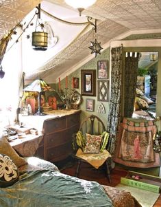 an attic bedroom with lots of furniture and decor