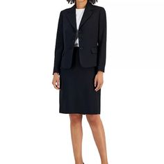 Elevate Your Workwear Game With This Women's Skirt Suit From Le Suit, Ensuring You'll Command The Boardroom With Confidence And Leave A Lasting Impression. Pair With Your Favorite Cami & Heels As It Transitions Seamlessly To Evening Wear. Career Capsule Wardrobe. Jacket Has A Notched Collar With Three Button Closure. Sleeves Are Notched At Wrist. Front Welted Pockets. Padded Shoulders. Lined Skirt Has A Pencil Silhouette With Hook And Zipper Closure At Back. Back Flap. Lined. 100% Polyester Waff Black Notch Lapel Skirt Suit For Office, Black Notch Lapel Skirt Suit For Work, Black Skirt Suit With Notch Lapel For Work, Tailored Black Skirt Suit For Business, Tailored Black Skirt Suit For Work, Classic Black Business Skirt Suit, Classic Black Skirt Suit For Office, Classic Black Skirt Suit For Business, Classic Black Skirt Suit For Work