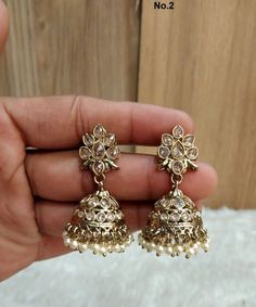 *Antique gold jhumka earrings Gold Jhumkas With Latkans For Celebration, Gold Chandbali Jhumkas With Latkans, Gold Bollywood Jhumkas With Tilla Details, Bollywood Style Gold Jhumkas With Tilla, Gold Chandbali Jhumkas With Cutdana, Gold Bollywood Jhumkas For Celebration, Gold Kundan Jhumkas For Diwali, Heavy Gold Jhumkas For Festive Occasions, Bollywood Style Gold Jhumkas With Cutdana