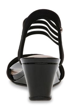 An ankle strap adds sporty style to this open-toe wedge sandal that is perfect for a day in the sun. 58mm heel Open toe Striped strap detail Slip-on Wedge heel Textile and synthetic upper/synthetic lining and sole Imported Black Slingback Sandals With 4-inch Heel For Summer, High Heel Sandals With Arch Support And Medium Width, Black Open Heel Sandals With Arch Support, Black Open Heel Shoes With Arch Support, Black Open Heel Heels With Arch Support, Black Wedge Heel Slingback Sandals, Black Low Heel Wedge Sandals For Summer, Synthetic Slingback Wedge Sandals Medium Width, High Heel Synthetic Wedge Sandals With Arch Support