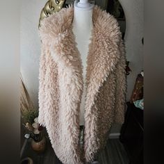 New With Tags. Small Tear On The Inside Lining, See All Photos. New With Tags. Super Funky And Cute. Two Side Pockets. Fully Lined. Machine Washable. Fits A Medium Too Measurements Length 35in Pit To Pit 19in Thank You For Supporting Small Business And Buying Secondhand Fluffy Beige Outerwear For Fall, Spring Cozy Fur Coat With Faux Fur Lining, Cozy Spring Fur Coat With Faux Fur Lining, Spring Fluffy Hooded Outerwear, Beige Fluffy Outerwear For Cold Weather, Hooded Fluffy Outerwear For Spring, Fluffy Hooded Spring Outerwear, Fluffy Beige Outerwear For Cold Weather, Chic Spring Hooded Fur Coat