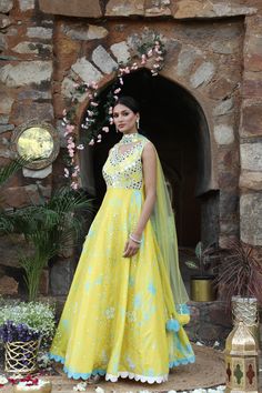 Featuring here Yellow, blue tie dye anarkali Set with mirror, bead,cutdana zari work paired with net choker dupatta. Fabric - Silk and net Components - 2 Colour - Yellow - blue Tie Dye Embroidery details - Hand Embroidery Delivery time - 2-3 weeks Washing Instructions - Dry-clean Floor-length Tissue Silk Salwar Kameez With Dupatta, Organza Dresses With Gota Work For Festivals, Organza Anarkali Set With Sheer Dupatta, Festive Organza Dresses With Gota Work, Organza Salwar Kameez With Dupatta In Maxi Length, Maxi Length Organza Salwar Kameez With Dupatta, Organza Anarkali Set With Sheer Dupatta In Maxi Length, Anarkali Kundan Party Dress, Festival Organza Dresses With Gota Work