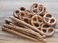 some pretzels are sitting on a wooden table