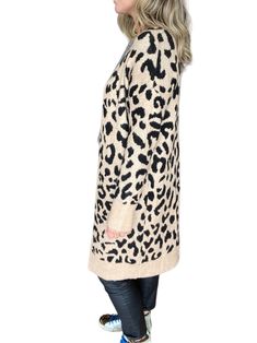 Bring on the wintry weather so you can slip into the cozy goodness of this roomy cardigan sweater. 50% Acrylic 25% Polyester 20% nylon 5% Elastin Hand wash cold Do not dry clean Chic Leopard Print Long Sleeve Cardigan, Chic Long Sleeve Leopard Print Cardigan, Trendy Leopard Print Winter Cardigan, Leopard Print Cardigan For Fall Layering, Fall Leopard Print Cardigan For Layering, Chic Leopard Print Cardigan For Fall, Chic Fall Leopard Print Cardigan, Leopard Print Cardigan, Road Design