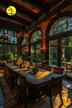 a dining room with large windows and wooden tables