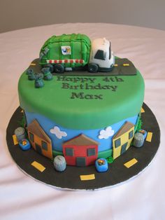 a birthday cake with a truck and trailer on it