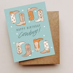 a birthday card with cowboy boots on it