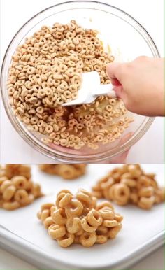 a bowl filled with cheerios being held by a hand and another bowl full of cereal