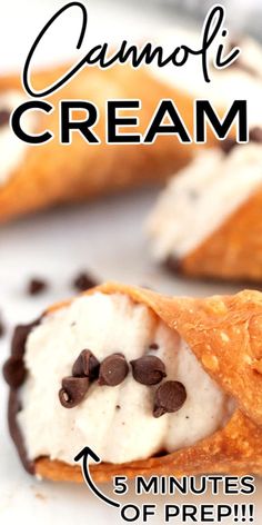 a close up of food on a plate with the words cannoli cream over it