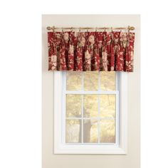 a window with a red curtain hanging from it's side