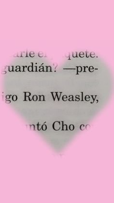 a heart with words written on it in black and white, against a pink background