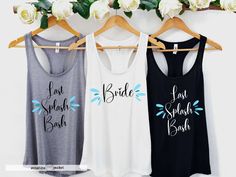 three bride tank tops hanging on a rack