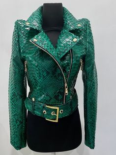 Emerald Women's Snakeskin Jacket PREMIUM QUALITY LUXURY STYLE Outside: GENUINE GLOSSY PYTHON LEATHER Accessories: silver color (please see the photo). All our products are 100% handmade, we always try to create interesting ideas to make your style unique. We use only the highest quality materials and accessories from around the world and only best leather from Indonesia. Before listing each new model undergoes different quality and usability tests at every stage of production. Every single piece Luxury Leather Jacket With Crocodile Pattern For Winter, Trendy Green Biker Jacket With Zipper Closure, Green Long Sleeve Biker Jacket, Green Biker Leather Jacket With Zipper, Green Biker Leather Jacket With Zipper Closure, Green Moto Leather Jacket With Long Sleeves, Green Fitted Biker Jacket, Fitted Green Moto Biker Jacket, Fitted Moto Biker Jacket In Green