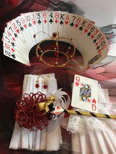 an assortment of playing cards and accessories on display