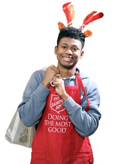 a man wearing an apron and reindeer antlers on his head