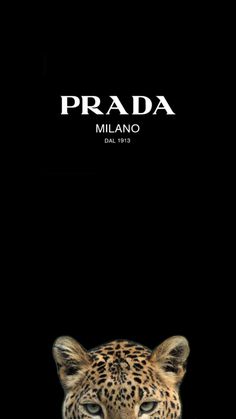 a leopard with its eyes closed and the words prada on it