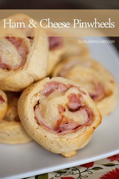 ham and cheese pastry rolls on a white plate