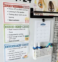 a white refrigerator freezer sitting next to a wall with magnets and writing on it