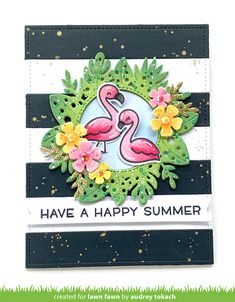 a card with a flamingo on it and flowers in the center, says have a happy summer