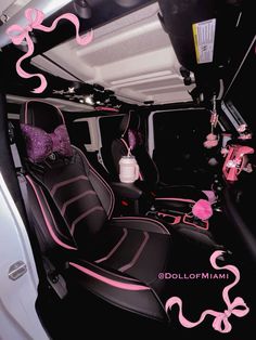 the interior of a vehicle with pink and black trimmings on it's seats