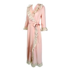 1930s-40s pink rayon with cream lace wrap & tie robe. A beautiful robe reminiscent of robes worn in Hollywood movies from the late 1930s thru the early 1940s. Silky pink rayon is trimmed with a deep ruffle of ivory cream lace. The robe has a deep collar with a wrap front and attached self tie belt. 3/4 length sleeves with lace cuffs. The robe closes at the side front outside with a snap and on the inside with a self tab with hook & eye. The bias skirt skims the hips and flares at the hem. Unline 1930s Nightgown, 1920s Robe, Vintage Fashion 1930s, 1900 Fashion, Bias Skirt, Hollywood Movies, Lace Cuffs, Color Crema, Lace Wrap